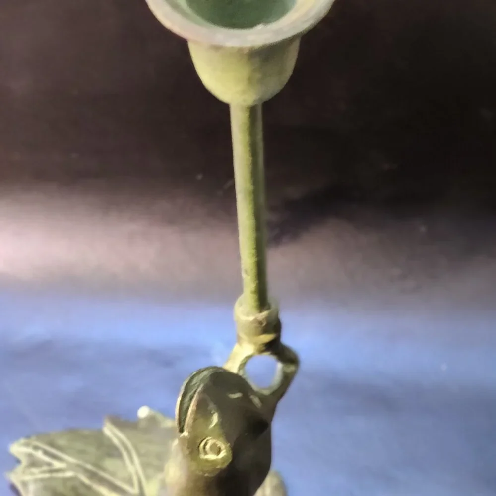 Brass Frog Sculpture holding a candlestick while floating on a lilypad 11